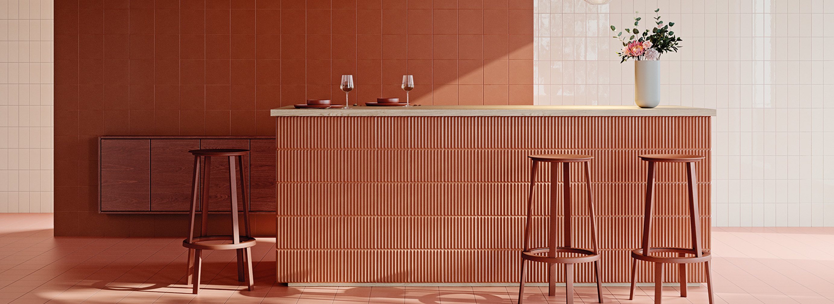 Rzut pomieszczenia w odcieniach brzoskwini. Po środku bar wykończony brzoskwiniowymi płytkami ryflowanymi.